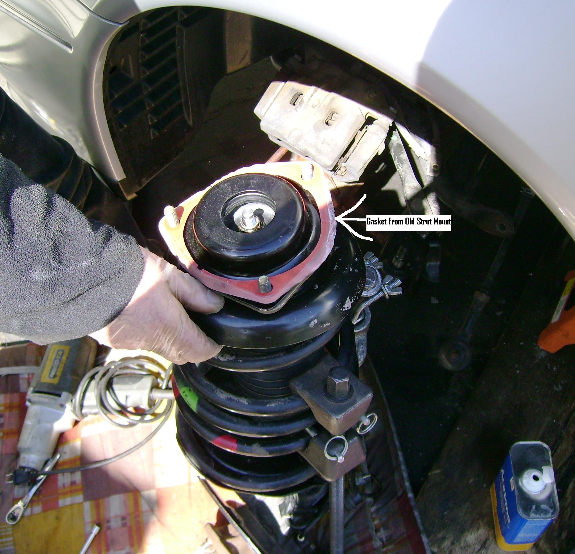 How to change front struts on 2004 nissan titan #6
